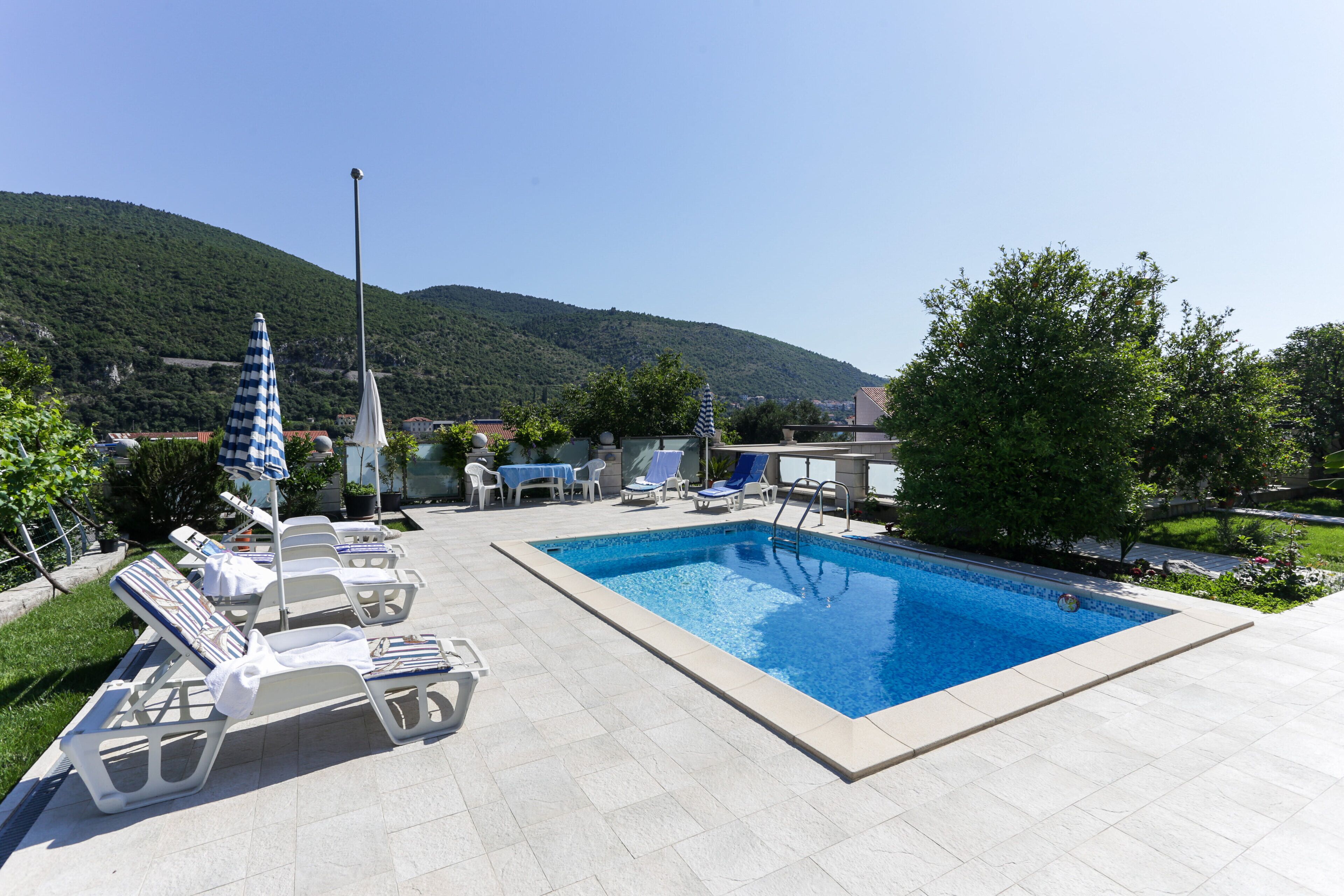 Outdoor pool, sun loungers