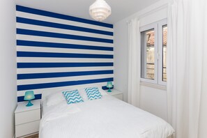 1 غرفة نوم ومكواة/لوح كي وخدمة الإنترنت وملاءات أسرّة