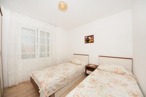 2 quartos, Wi-Fi de cortesia, roupa de cama