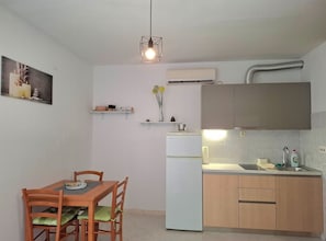 Fridge, stovetop, cookware/dishes/utensils