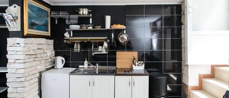 Fridge, stovetop, cookware/dishes/utensils