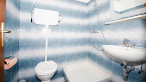A bathroom with a toilet, a sink, and a shower. - Guest House Rooms Rose - Romantic Double Room with Balcony and Sea View (No.2) (Molunat)