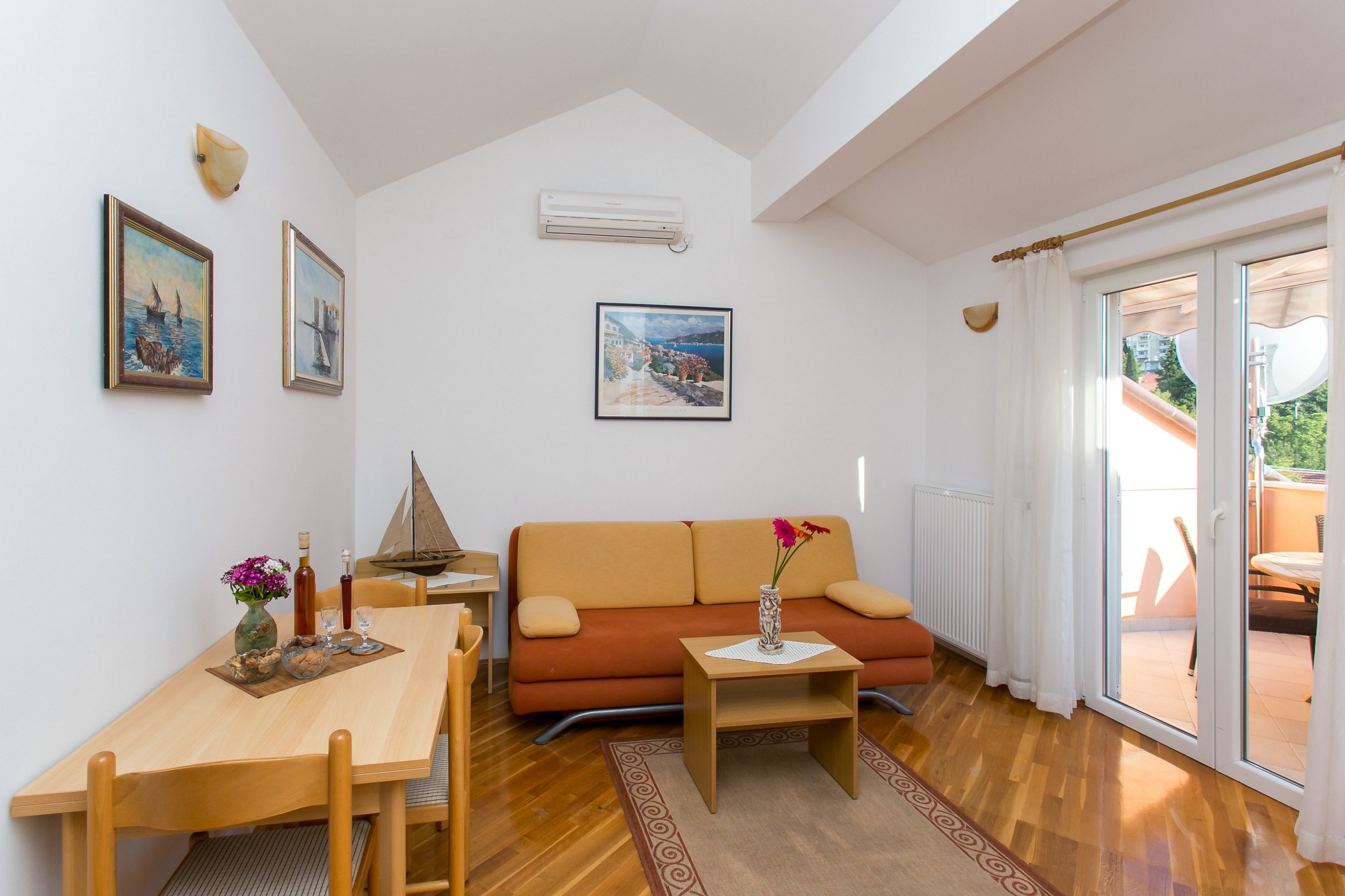 Apartment, 1 Bedroom, Balcony, Garden View | Living area | 42-inch flat-screen TV with cable channels, TV