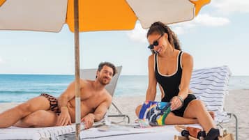 Beach nearby, white sand, sun-loungers, beach umbrellas