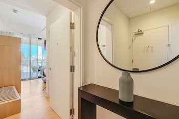 Premium Suite, City View, Corner | Minibar, in-room safe, desk, laptop workspace at The March Hotel