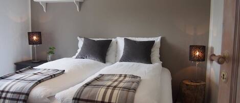 Suite, 2 Bedrooms | Blackout drapes, free cribs/infant beds, free WiFi, bed sheets