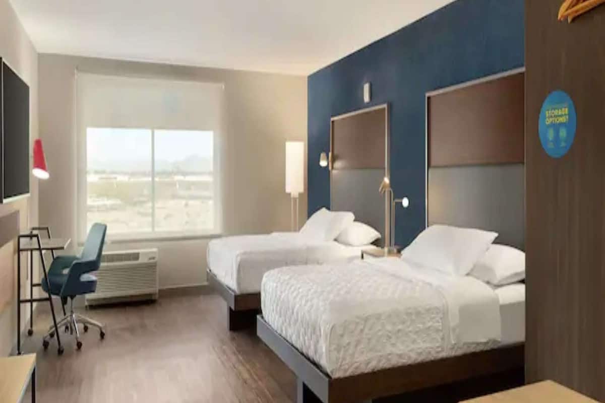 desk, laptop workspace, blackout curtains, iron/ironing board