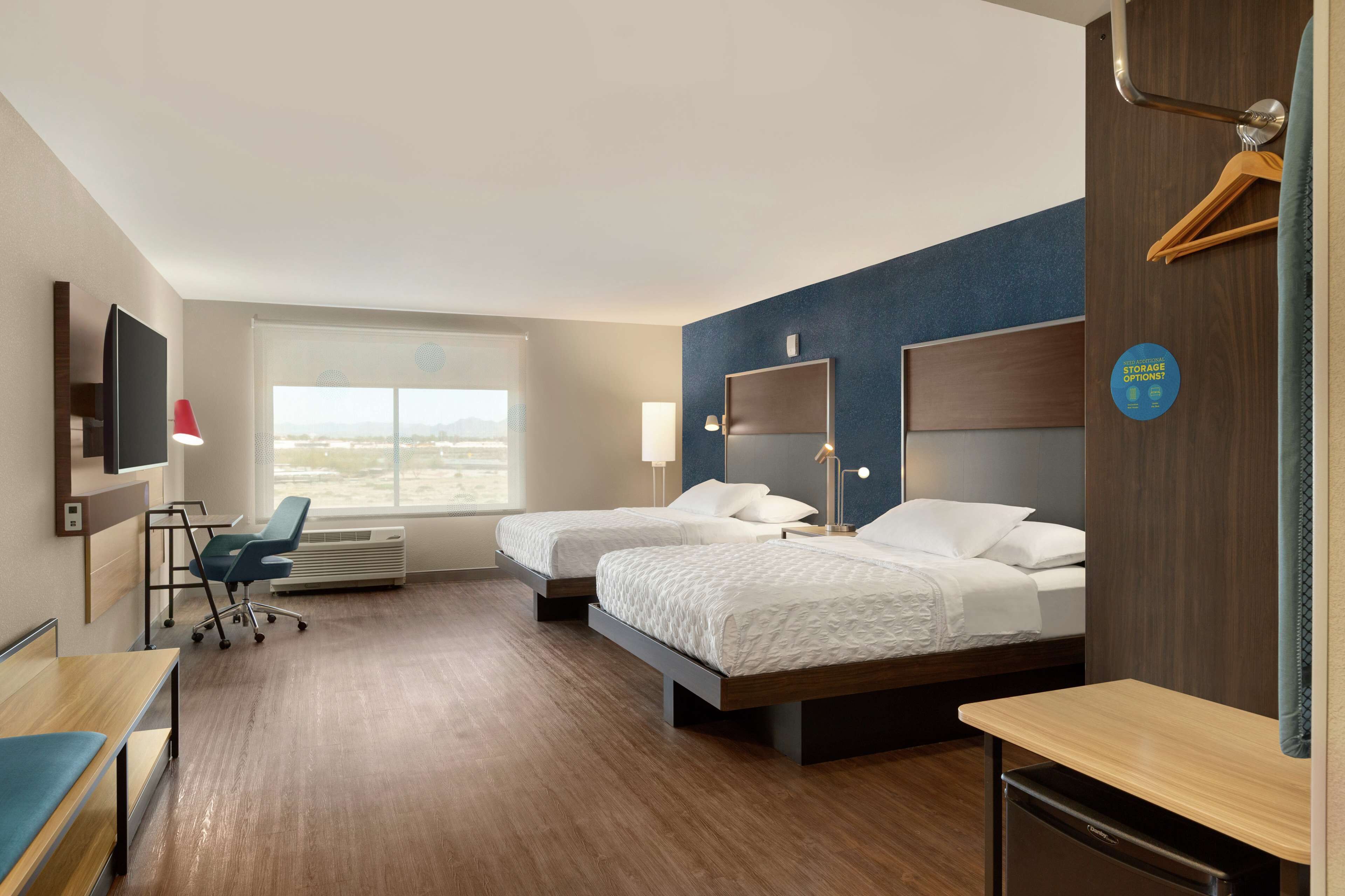 desk, laptop workspace, blackout curtains, iron/ironing board