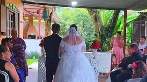 A wedding ceremony with a bride in a white dress walking down a red carpet. - OUR PARADISE available Christmas New Year <br>End of March holiday promotion 981113133 (Arujá)