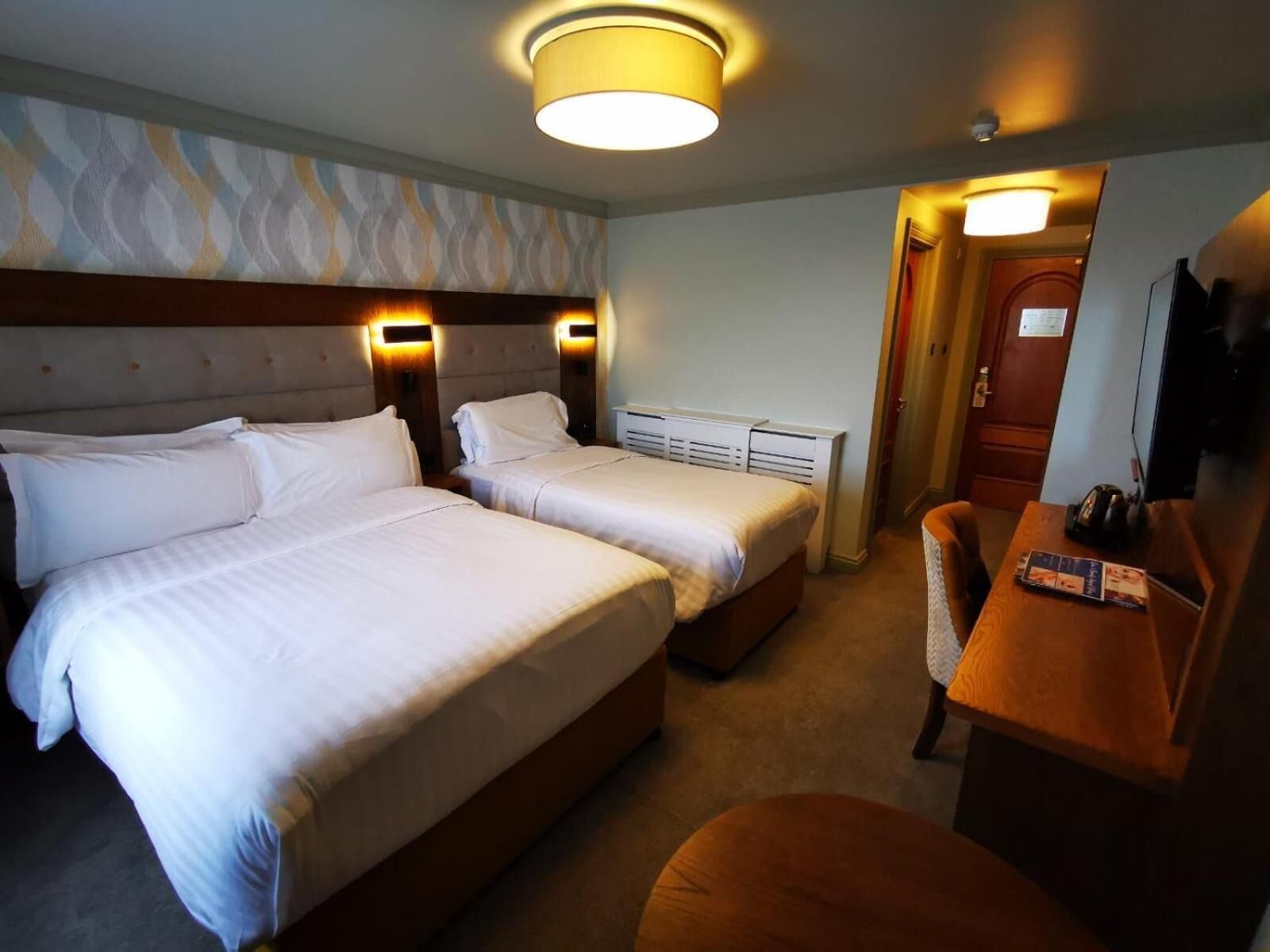 premium bedding, memory-foam beds, desk, soundproofing