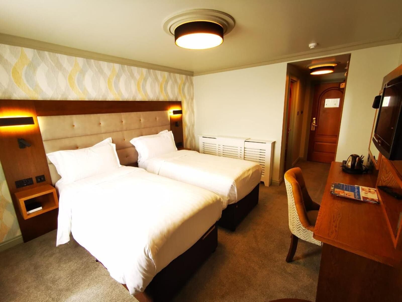 premium bedding, memory-foam beds, desk, soundproofing