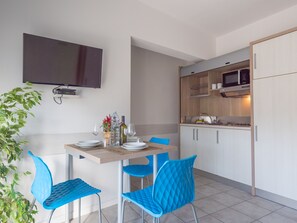 Apartment, 1 Bedroom, Balcony, Partial Sea View (Bilocale) | Private kitchenette | Full-size fridge, microwave, stovetop, highchair