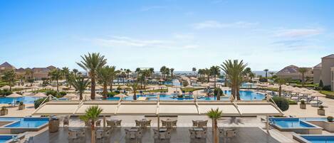 Indoor pool, 6 outdoor pools, open 10:00 AM to 5:00 PM, pool umbrellas