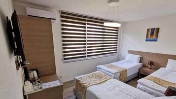 Desk, free WiFi, bed sheets