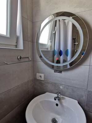 Slippers, towels, soap, toilet paper