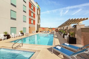 Outdoor pool, pool umbrellas, sun loungers