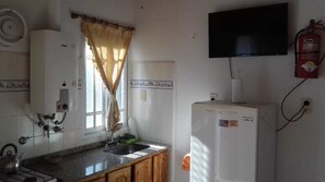Appartement familial | Cuisine privée | Réfrigérateur grande capacité avec congélateur, un four