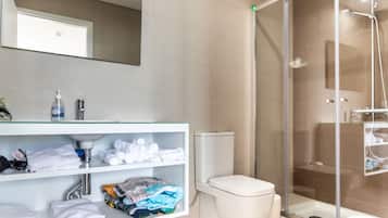Economy Double Room | Bathroom | Shower, hair dryer, towels