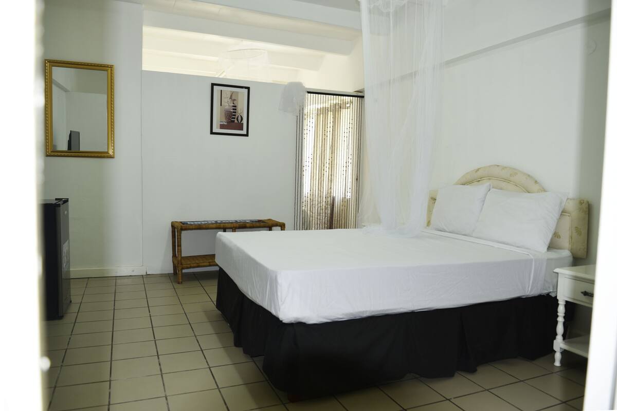 Family Room | In-room safe, laptop workspace, blackout drapes, iron/ironing board