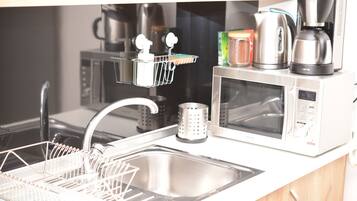 Comfort Apartment | Private kitchen | Full-sized fridge, microwave, oven, toaster