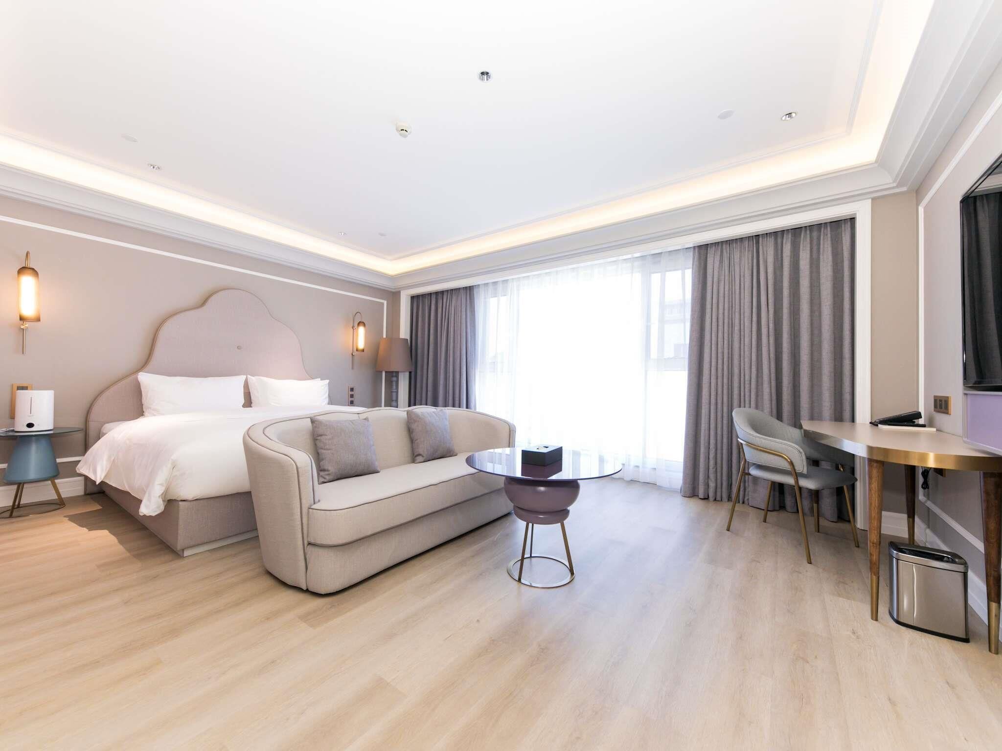 Privilege, Room, 1 King Bed | Minibar, in-room safe