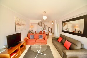 TV, DVD player, video library, stereo