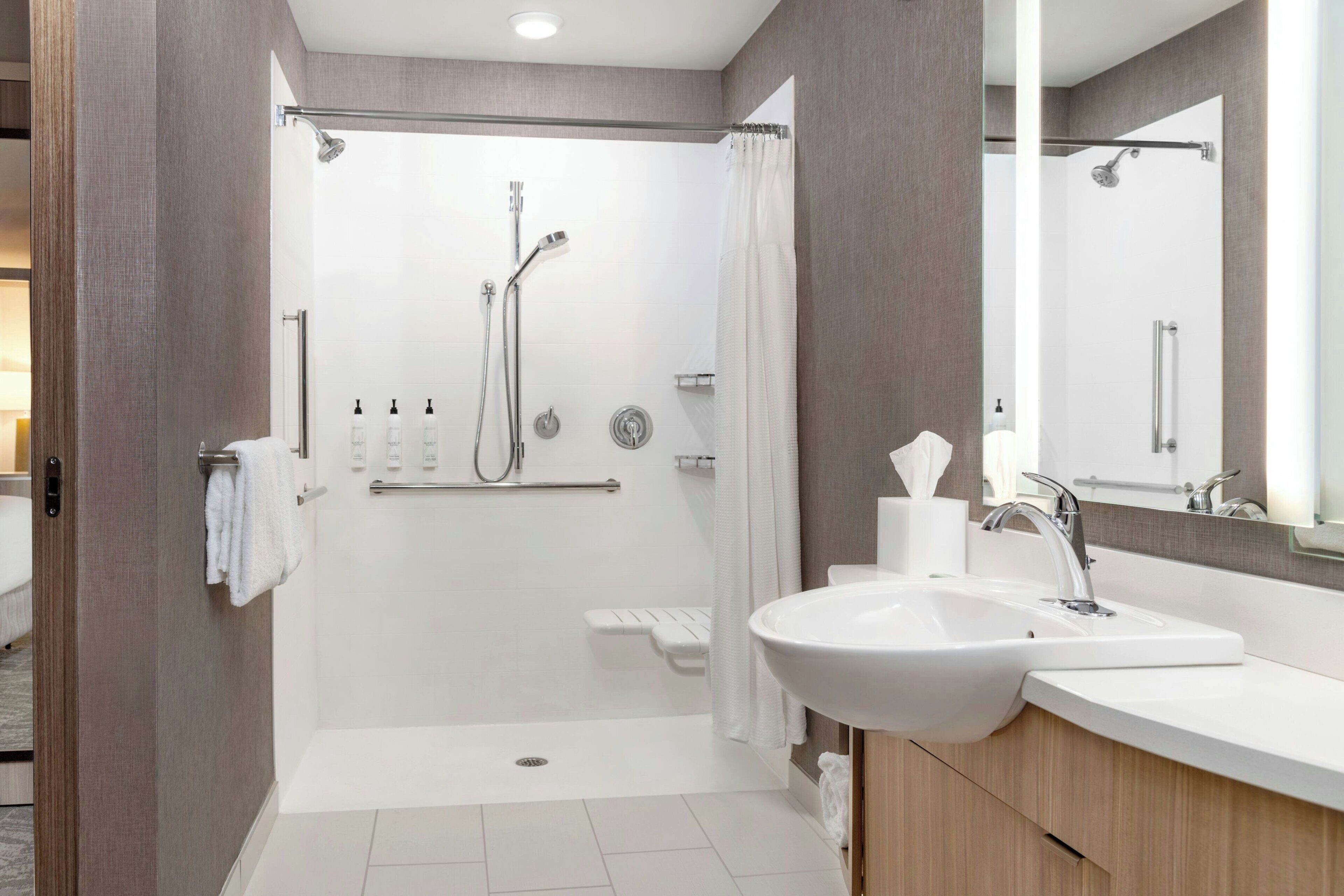 shower, free toiletries, hair dryer, towels