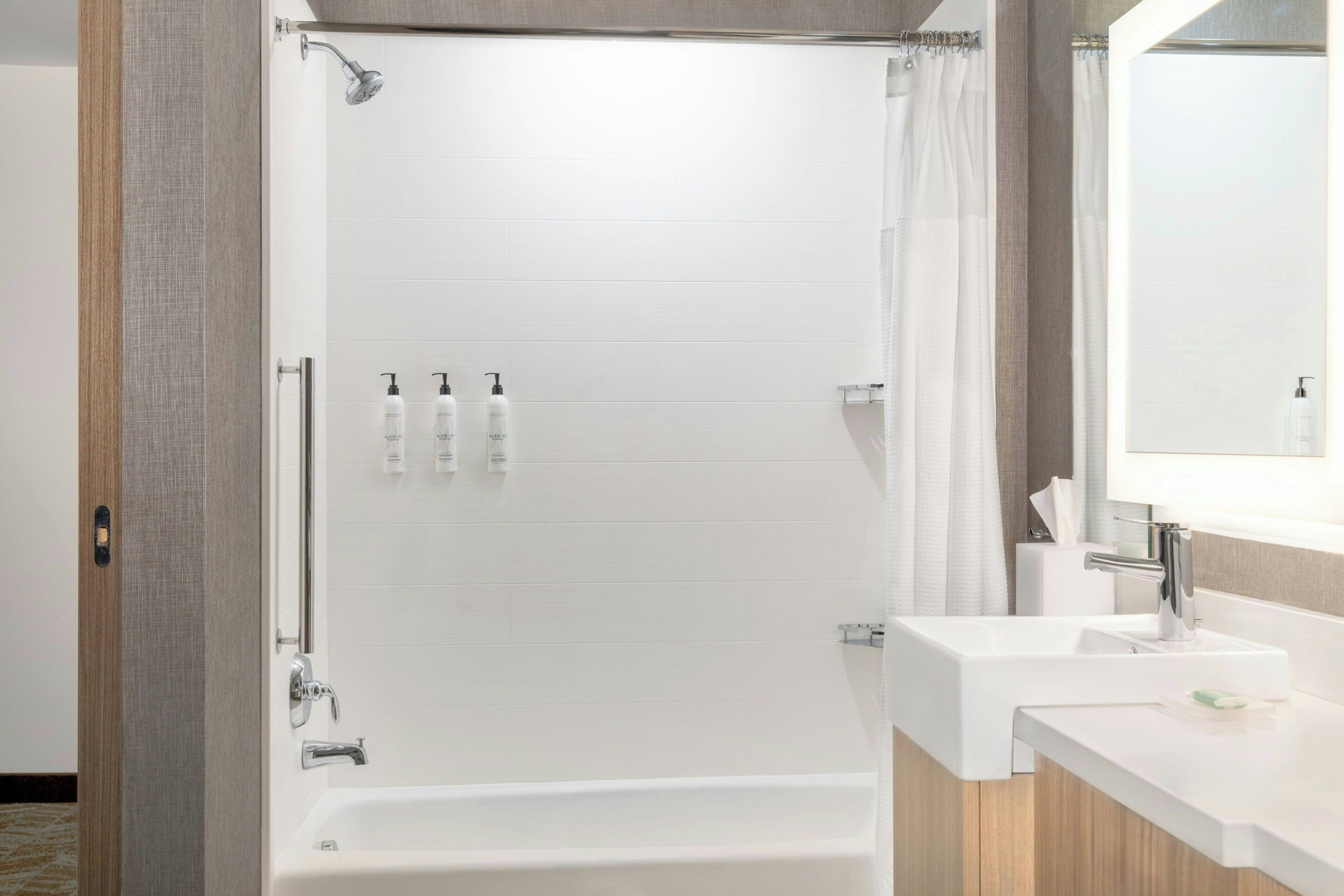 shower, free toiletries, hair dryer, towels