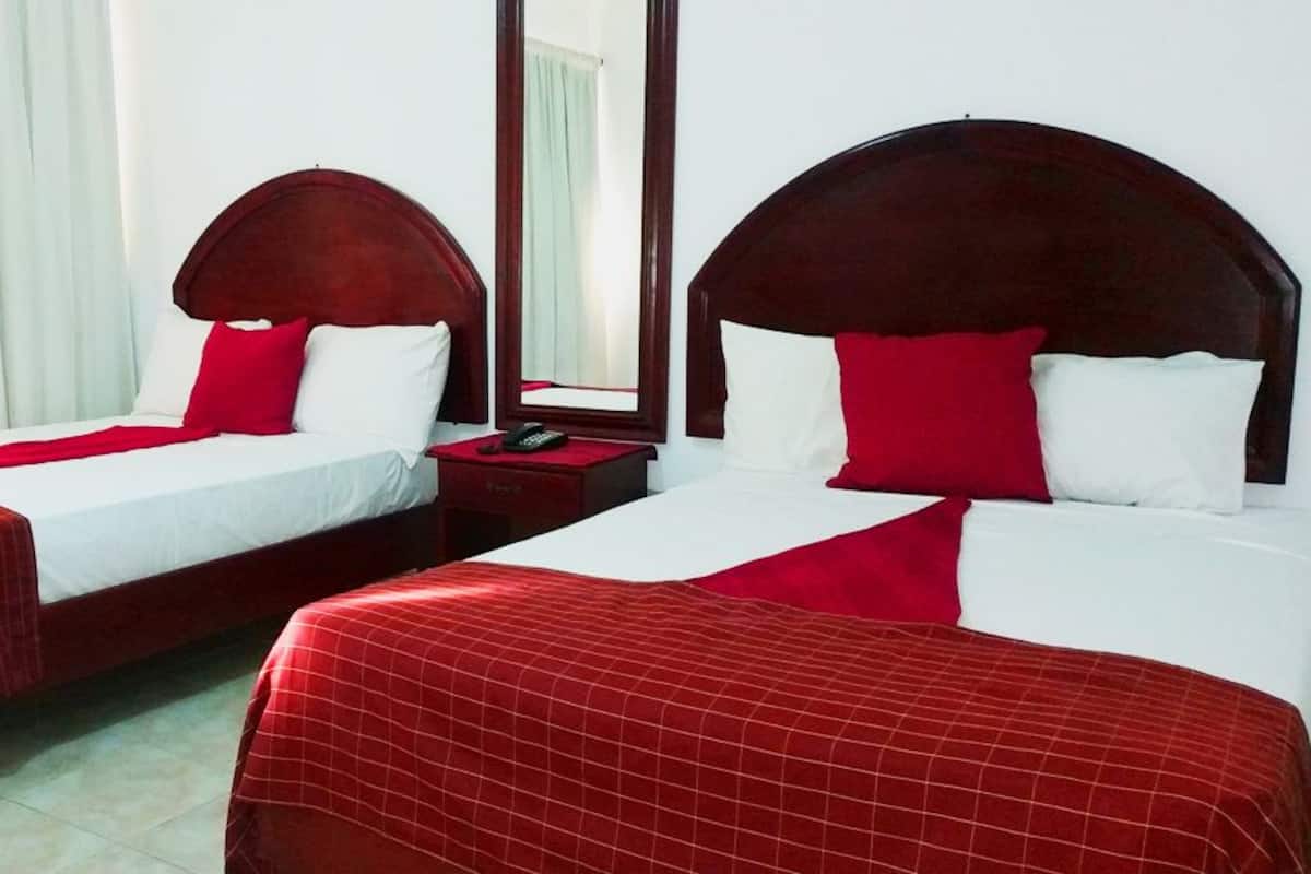 Double Room | Blackout drapes, iron/ironing board (on request), bed sheets