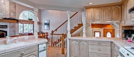 Cabin | Private kitchen | Full-sized fridge, microwave, oven, stovetop