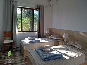 Standard Twin Room | Blackout curtains, iron/ironing board, free WiFi, bed sheets