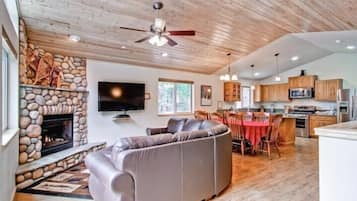 Cabin | Living room | 55-inch flat-screen TV with satellite channels, TV, fireplace