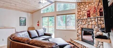 Cabin | Living room | 55-inch flat-screen TV with satellite channels, TV, fireplace