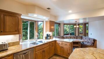 Cabin (Four Seasons) | Private kitchen | Full-size fridge, microwave, oven, dishwasher