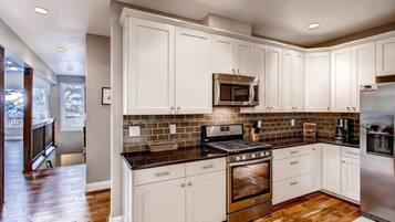Cabin (Kildrummy Lodge) | Private kitchen | Full-size fridge, microwave, oven, stovetop