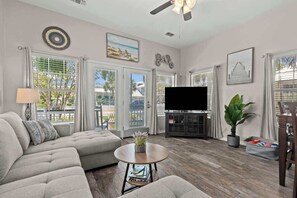 TV, fireplace, books, offices