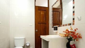 Shower, rainfall showerhead, towels, soap