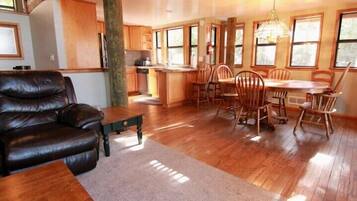 Cabin (Tree House Lodge) | Living area | Flat-screen TV, fireplace