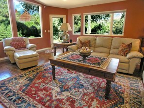 Smart TV, fireplace, books, stereo