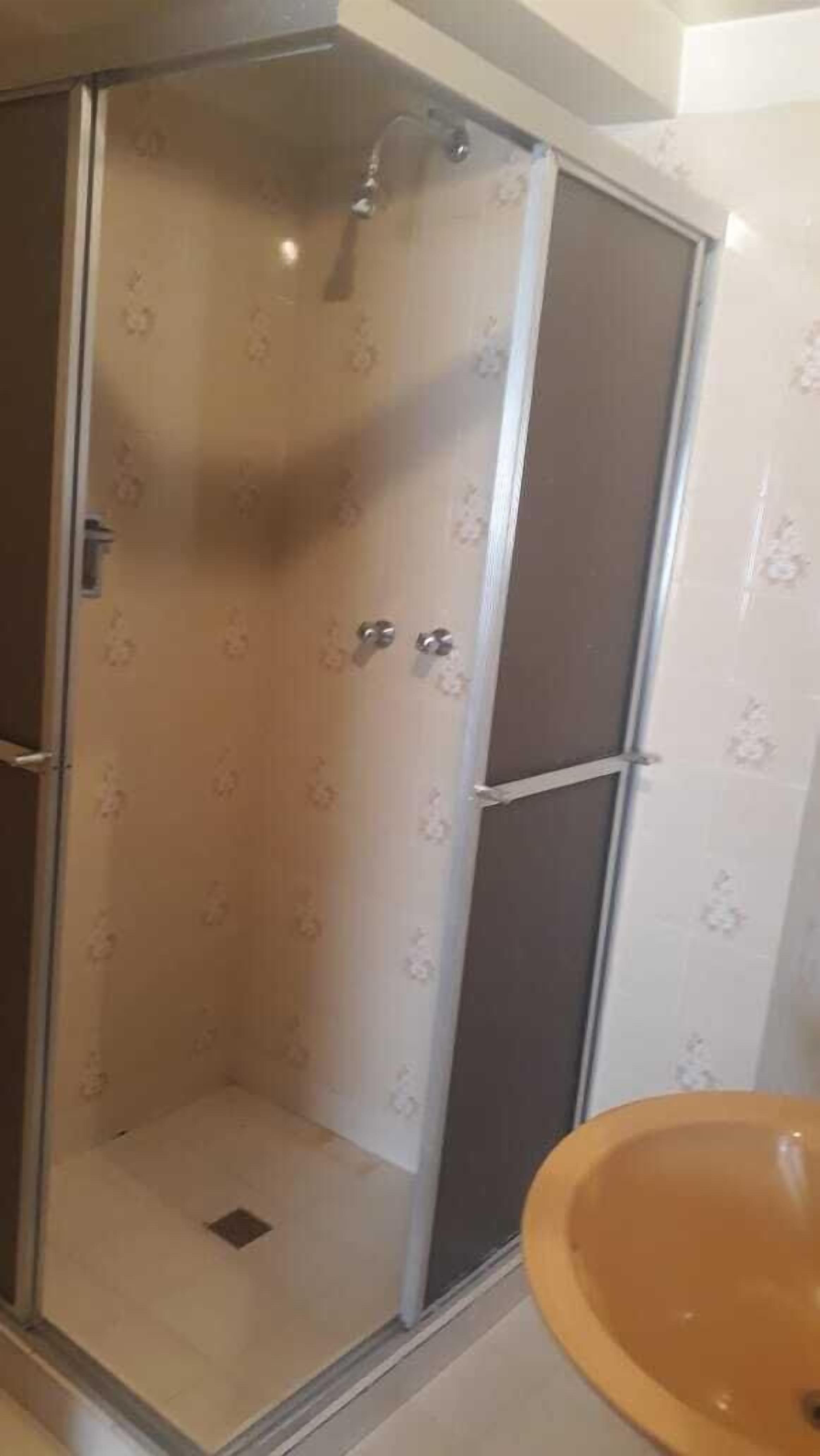 shower, towels, soap, toilet paper