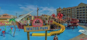 Enjoy thrilling water slides and play structures at the resort's Water Park, including a large slide and a spiral slide.