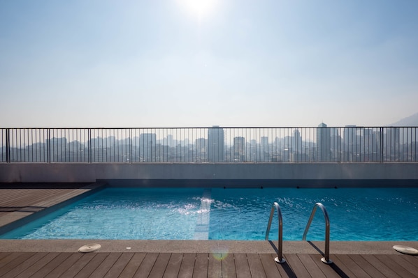 Seasonal outdoor pool, a rooftop pool