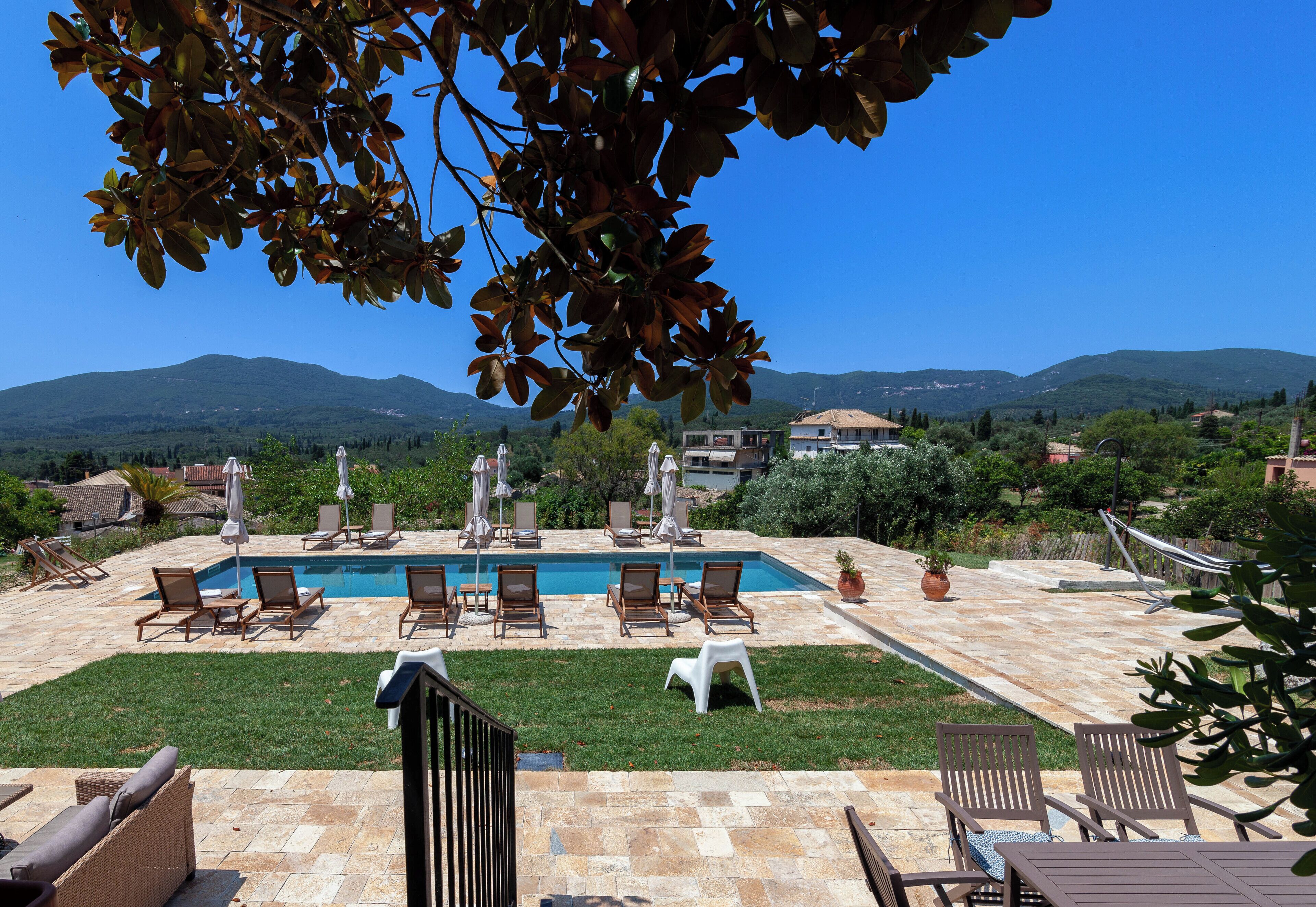 Seasonal outdoor pool, pool umbrellas, pool loungers