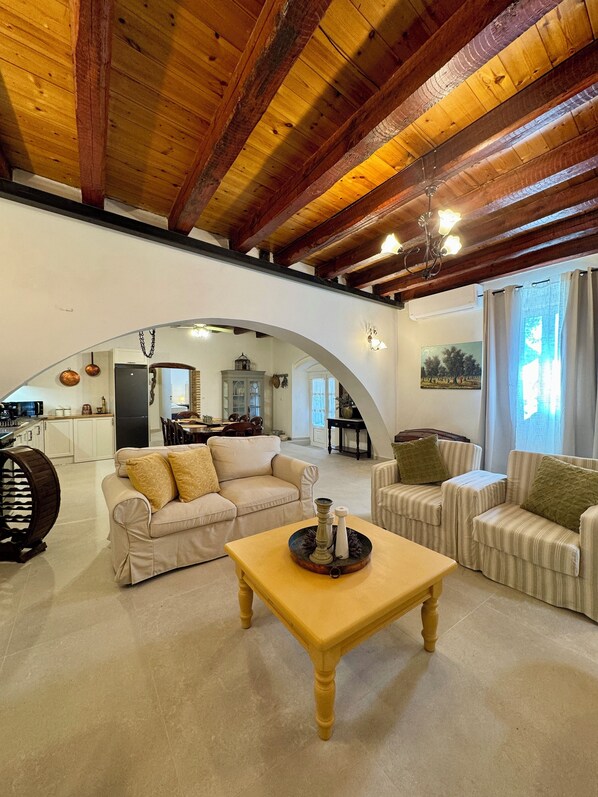 Family Twin Room, 2 Bedrooms, Non Smoking, Pool View | Living area | 43-inch flat-screen TV with satellite channels, TV, fireplace