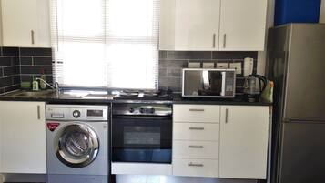 Classic Apartment, 1 Bedroom | Private kitchen | Full-size fridge, microwave, oven, stovetop