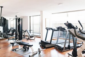 Fitness facility - El Cosmopolita Apartment (Santiago)