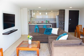 60-inch flat-screen TV with cable channels, TV, Netflix