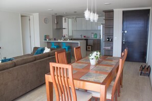 Apartment | Living area | 60-inch flat-screen TV with cable channels, TV, Netflix - Kennedy Blue Acquistion (Santiago)