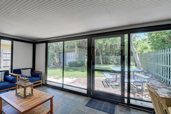Air conditioned, screened in porch leading out to private backyard/BBQ area