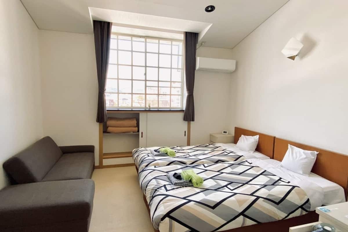 economy triple room | desk, blackout curtains, free wifi, bed sheets